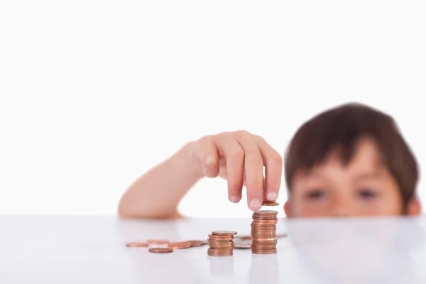 Young boy counting his change — Stock Photo, Image