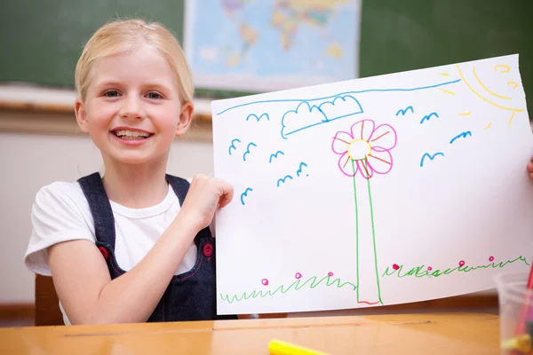 Girl showing her drawing — Stock Photo, Image