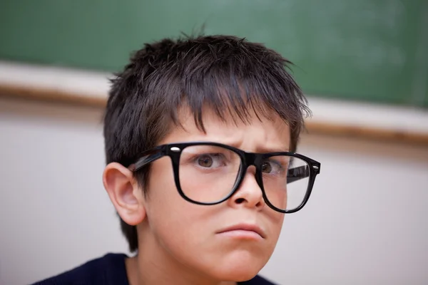 Close up of a serious schoolboy — Stock Photo, Image