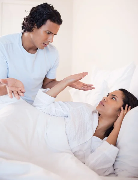 Couple arguing in the bedroom — Stock Photo, Image