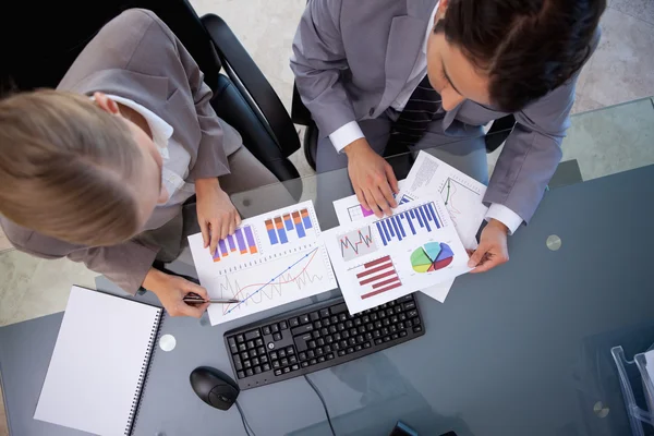 Business team looking at statistics Stock Image