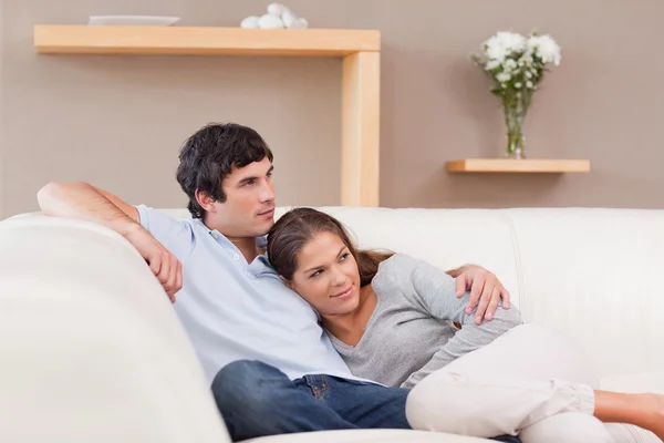 Couple being together on the couch — Stock Photo, Image