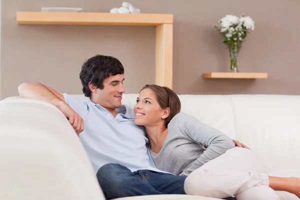 Couple on the sofa in love — Stock Photo, Image