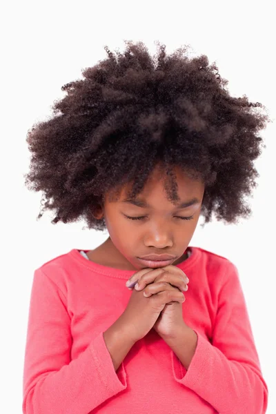 Portrait of a girl praying Royalty Free Stock Photos