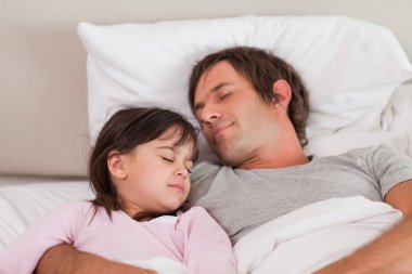 Father sleeping with his daughter clipart