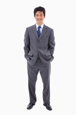 Portrait of a businessman standing up clipart