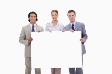 Businessteam holding blank sign clipart