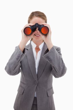 Bank employee looking through spyglasses clipart