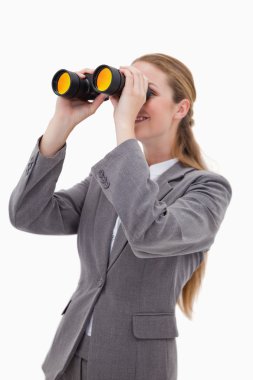 Side view of bank employee with spyglasses clipart