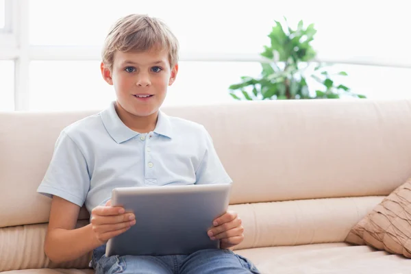 Happy boy using tablet computer — Stock Photo, Image