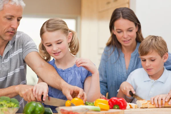 Lovely family cooking together — Stock Photo, Image