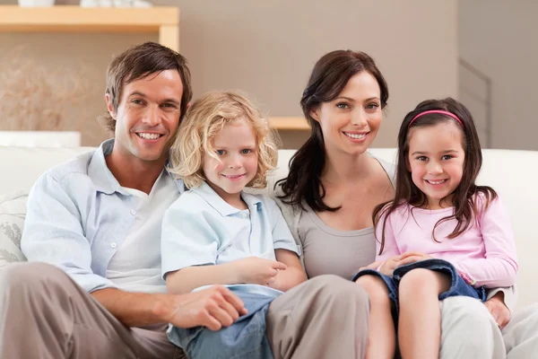 Cute family watching television together — Stock Photo, Image