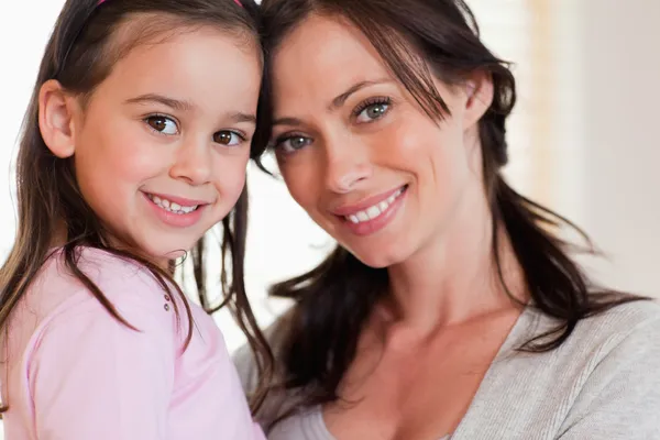 Close up of a girl and her mother — Stock Photo, Image