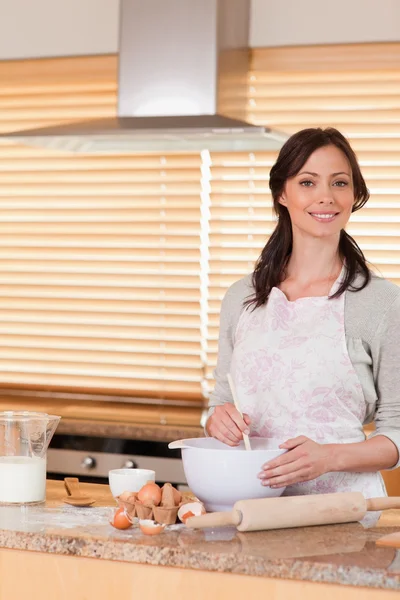 Portrait of a beautiful woman baking — Stock Photo, Image