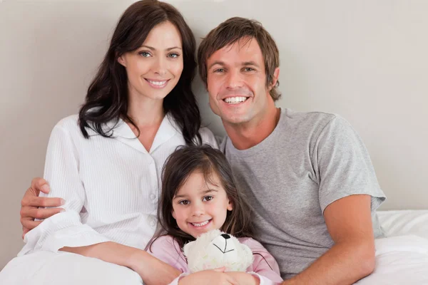Parents posing with their daughter — Stock Photo, Image