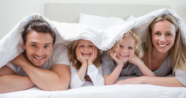 Family under the cover — Stock Photo, Image
