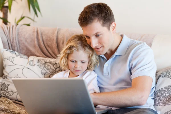 Father and son surfing the internet — Stock Photo, Image