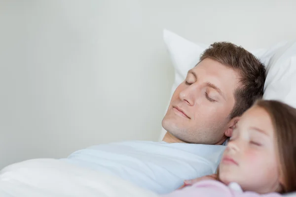 Father and daughter taking a nap — Stock Photo, Image