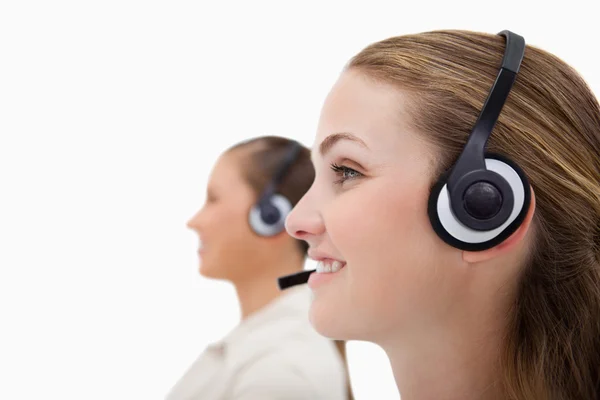 Side view of operators using headsets — Stock Photo, Image
