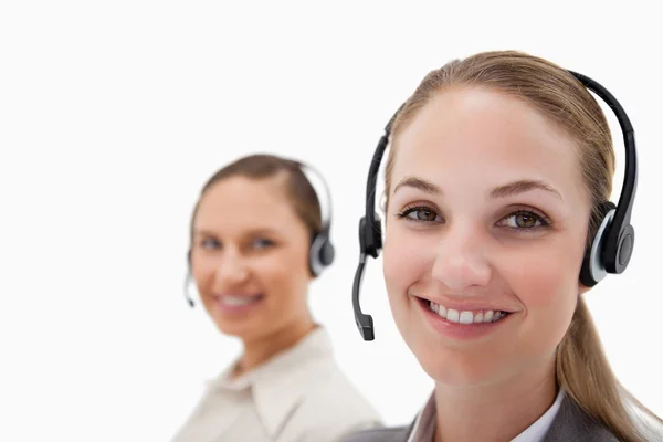 Young operators using headsets — Stock Photo, Image