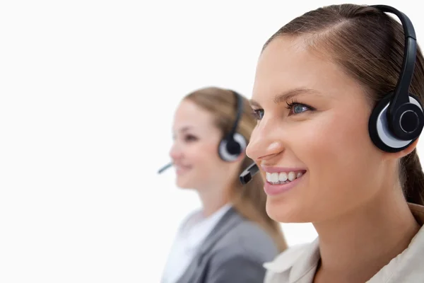Female operators using headsets — Stock Photo, Image