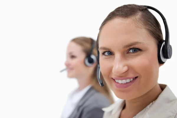 Sales persons using headsets — Stock Photo, Image