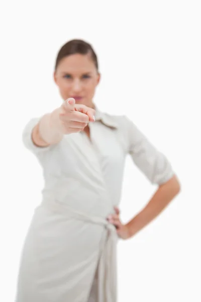 Portrait of a businesswoman pointing at the viewer — Stock Photo, Image