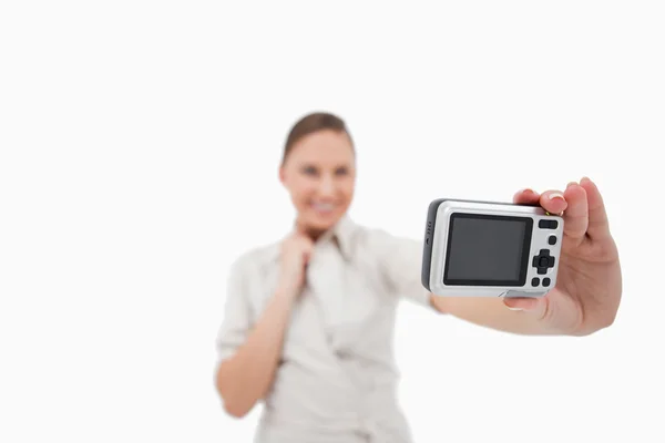 Businesswoman taking a picture of herself — Stock Photo, Image