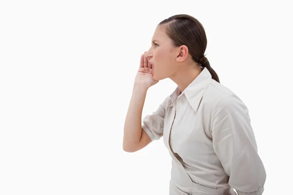 Vista lateral de una mujer de negocios gritando — Foto de Stock