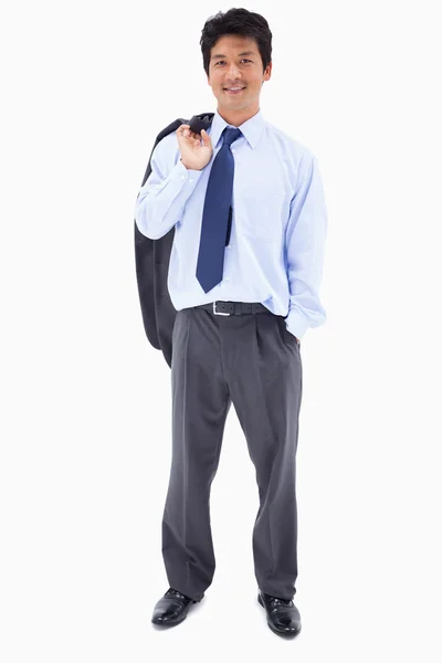 Portrait of a relaxed businessman with his jacket on his shoulde — Stock Photo, Image