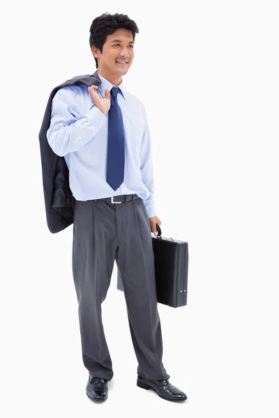 Retrato de un hombre de negocios sonriente sosteniendo un maletín y su ja —  Fotos de Stock