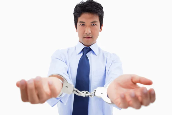 Businessman with handcuffs — Stock Photo, Image
