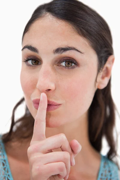 Portrait of a woman asking for silence — Stock Photo, Image