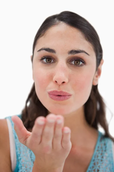 Portrait of a woman blowing a kiss — Stock Photo, Image