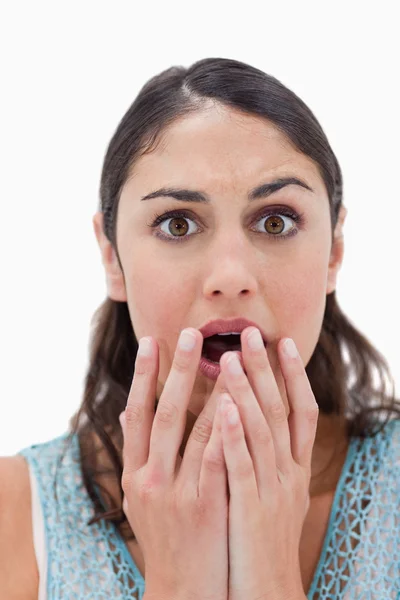 Portrait of a shocked woman gesturing — Stock Photo, Image