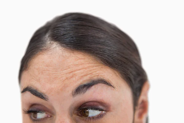Close up van een vrouw op zoek onder haar — Stockfoto