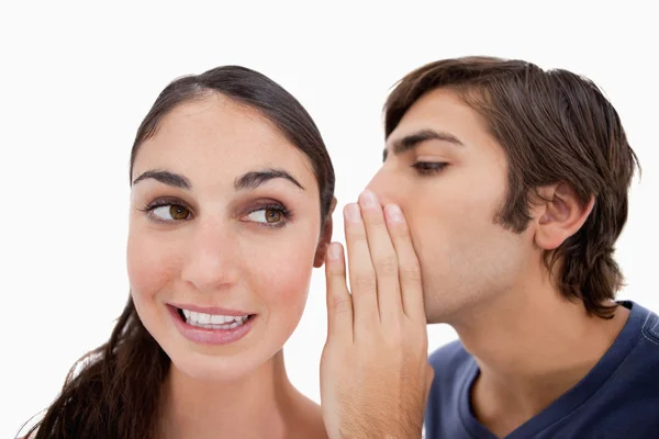 Man whispering something to his fiance — Stock Photo, Image