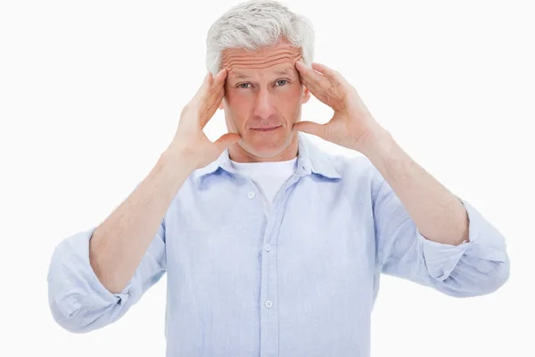 Mature man having a headache — Stock Photo, Image