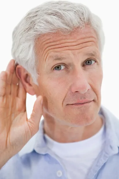 Portret van een man die geeft zijn oor — Stockfoto