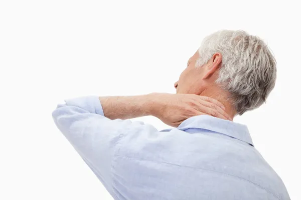 Homme mûr ayant une douleur au cou — Photo