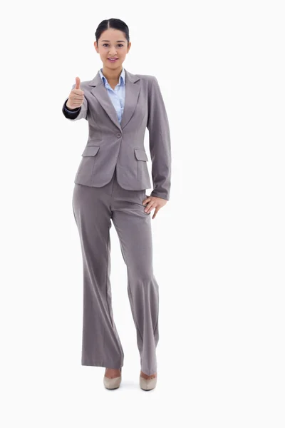 Портрет бізнес-леді позує з великим пальцем вгору — стокове фото