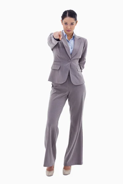Portrait of a serious businesswoman pointing at the viewer — Stock Photo, Image