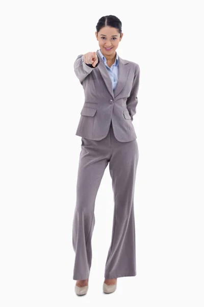 Portrait of a happy businesswoman pointing at the viewer — Stock Photo, Image