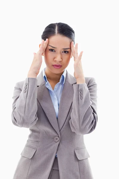 Portrait of a gorgeous businesswoman having a headache — Stock Photo, Image