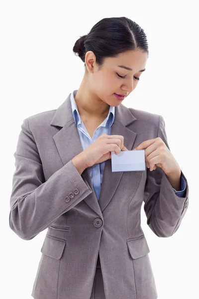 Portrait of a businesswoman clipping her badge — Stock Photo, Image