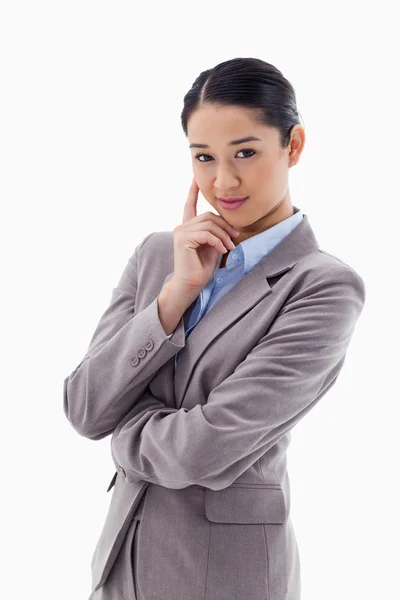 Portrait of a smiling businesswoman thinking — Stock Photo, Image
