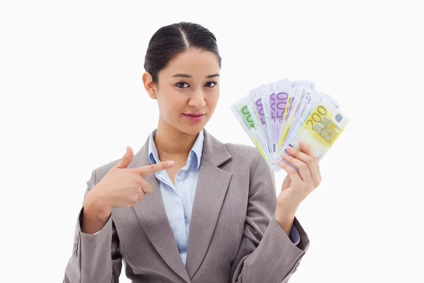 Businesswoman holding bank notes — Stock Photo, Image