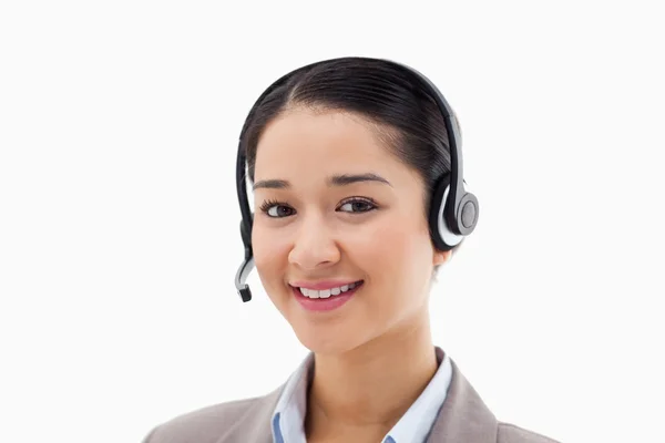 Smiling operator posing with a headset — Stock Photo, Image