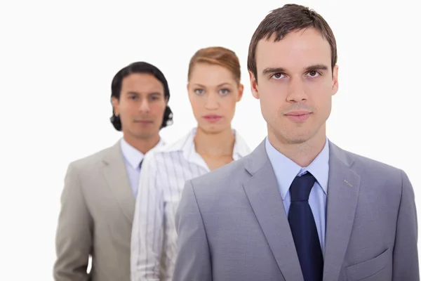 Serious businessteam lined up — Stock Photo, Image