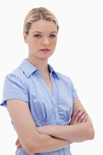 Woman standing with arms folded — Stock Photo, Image
